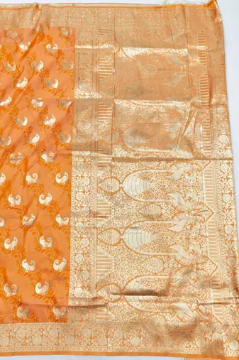 Orange zari woven silk blend saree with blouse piece