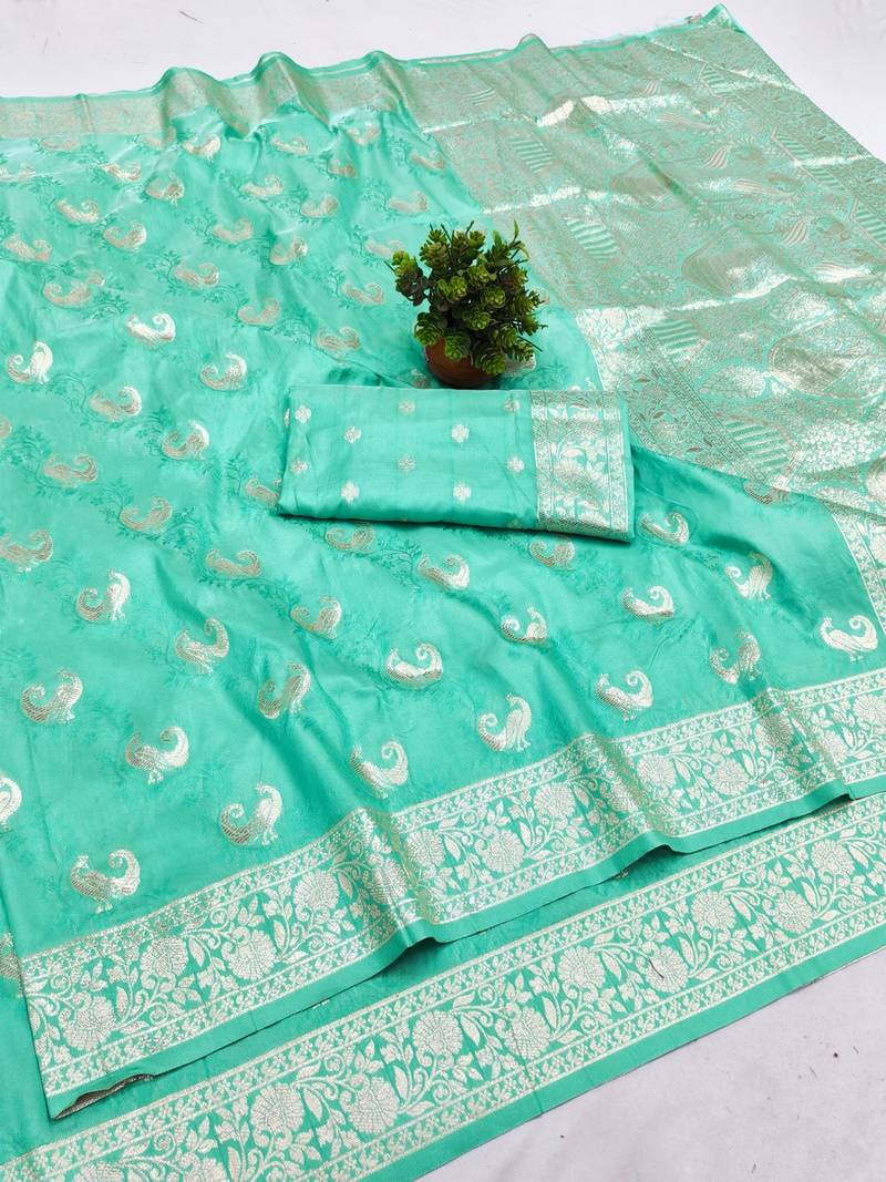 Light blue zari woven banarasi silk blend saree with blouse piece