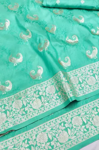 Light blue zari woven silk blend saree with blouse piece
