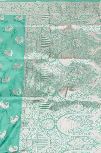 Light blue zari woven silk blend saree with blouse piece