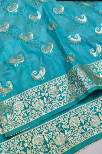 Blue zari woven silk blend saree with blouse piece