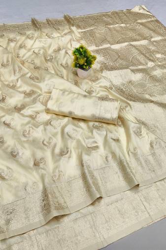 Cream zari woven silk blend saree with blouse piece