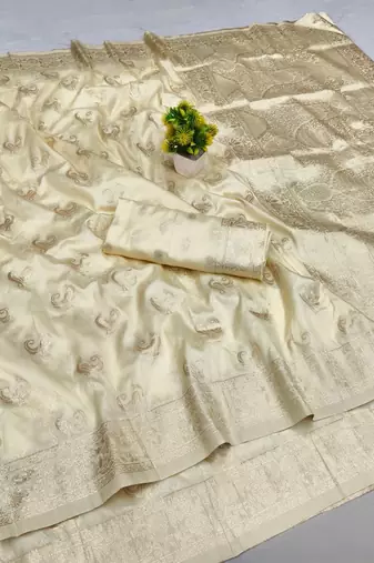 Cream zari woven banarasi silk blend saree with blouse piece