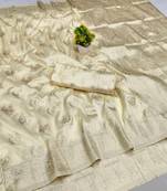 Cream zari woven banarasi silk blend saree with blouse piece