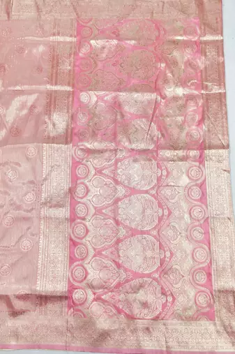 Pink zari woven silk blend saree with blouse piece