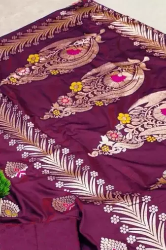 Wine zari woven silk blend saree with blouse piece