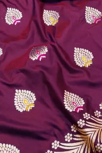 Wine zari woven silk blend saree with blouse piece