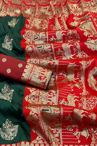 Dark green zari woven silk blend saree with blouse piece