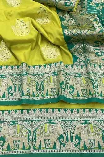Lime zari woven silk blend saree with blouse piece