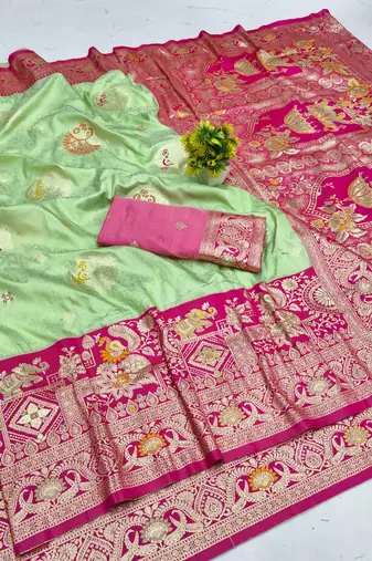 Light green zari woven banarasi silk blend saree with blouse piece