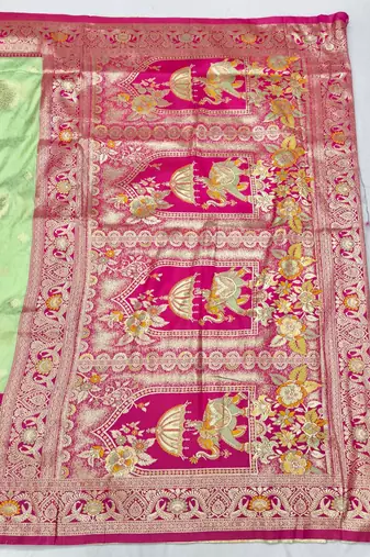 Light green zari woven silk blend saree with blouse piece