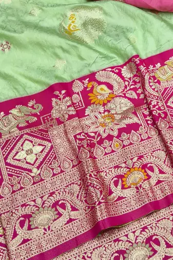 Light green zari woven silk blend saree with blouse piece