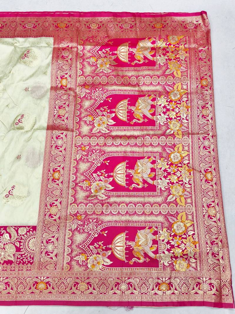 Cream zari woven banarasi silk blend saree with blouse piece