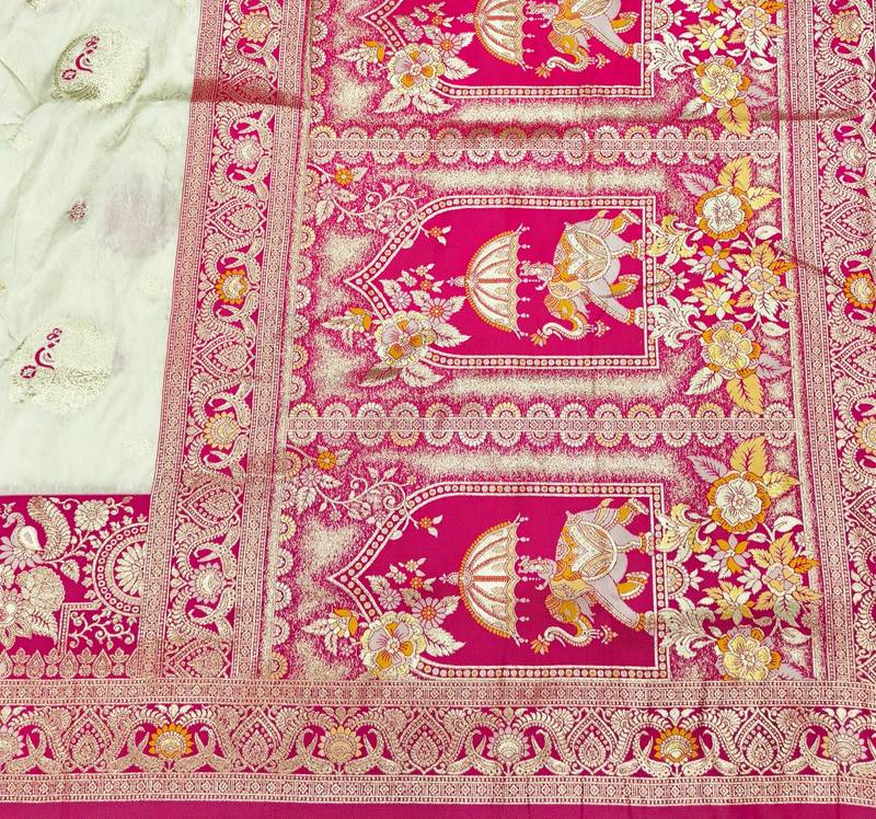 Cream zari woven banarasi silk blend saree with blouse piece