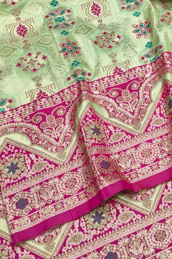 Pista zari woven patola silk blend festive saree with blouse piece