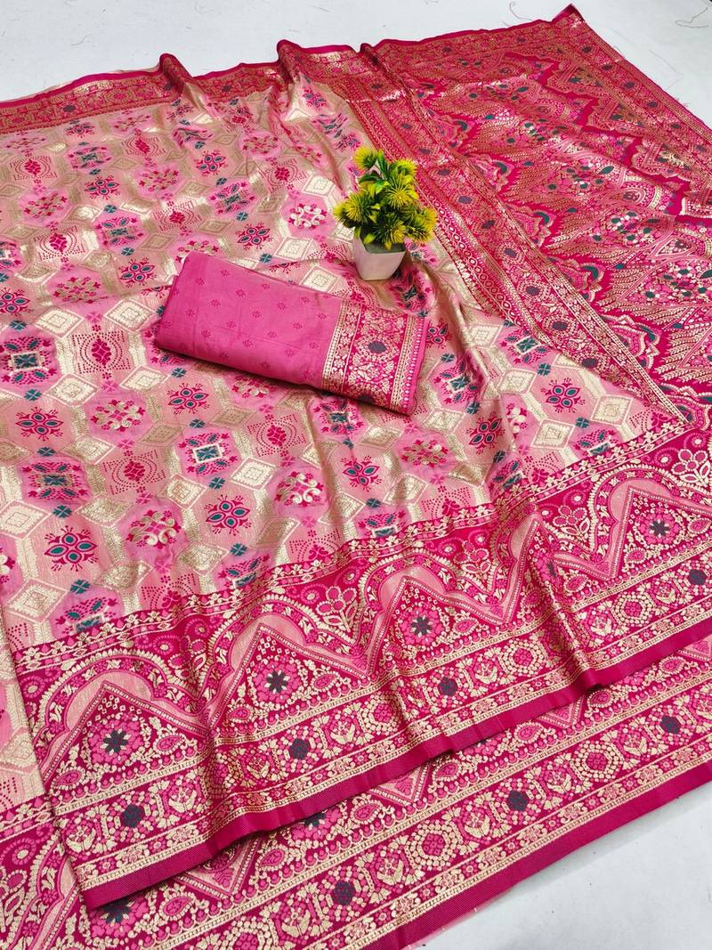 Pink zari woven patola banarasi silk blend festive saree with blouse piece