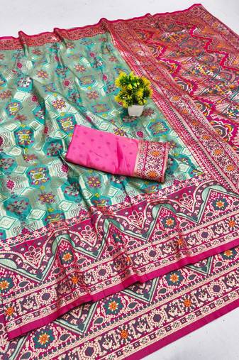 Blue zari woven patola banarasi silk blend festive saree with blouse piece
