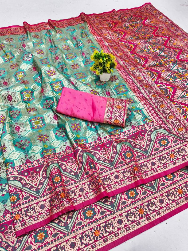 Blue zari woven patola banarasi silk blend festive saree with blouse piece