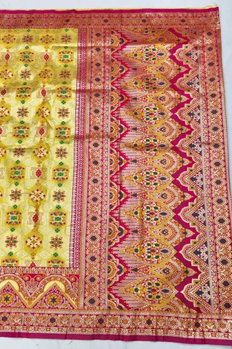 Gold zari woven patola silk blend festive saree with blouse piece