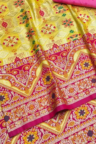 Gold zari woven patola silk blend festive saree with blouse piece