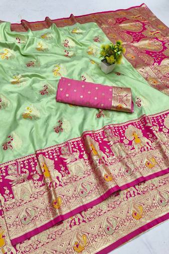 Light green zari woven banarasi silk blend saree with blouse piece