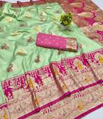 Light green zari woven banarasi silk blend saree with blouse piece
