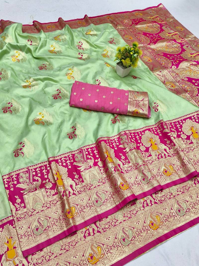 Light green zari woven banarasi silk blend saree with blouse piece