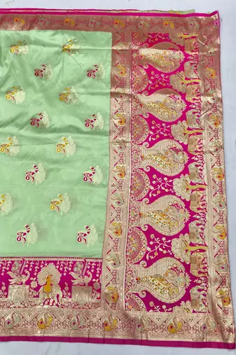 Light green zari woven silk blend saree with blouse piece
