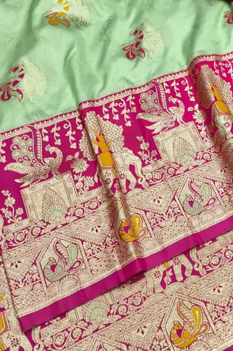 Light green zari woven silk blend saree with blouse piece