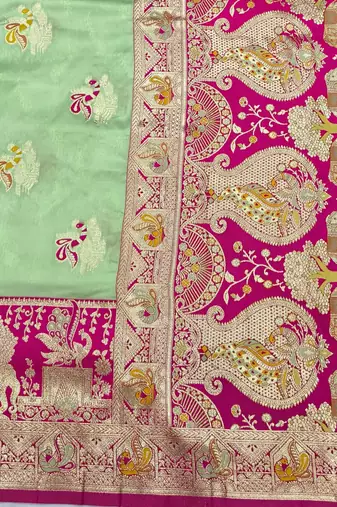 Light green zari woven silk blend saree with blouse piece