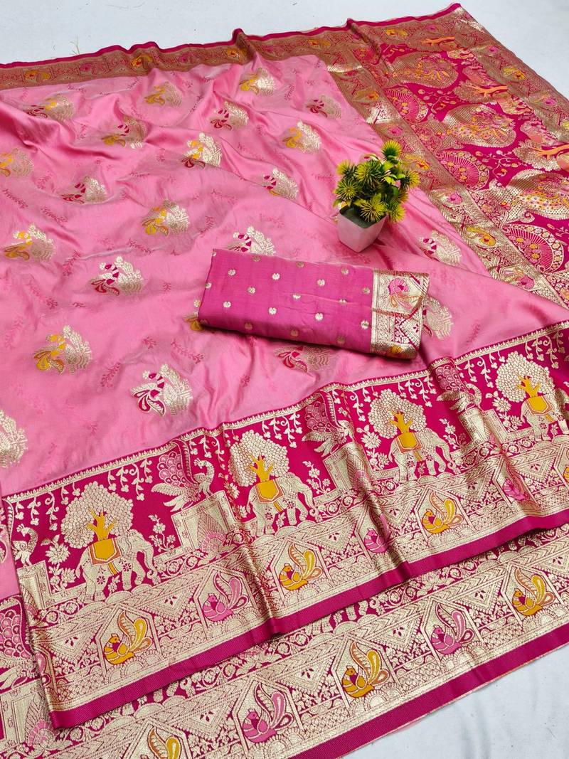 Pink zari woven banarasi silk blend saree with blouse piece