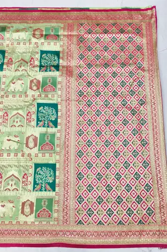 Pista zari woven patola silk blend festive saree with blouse piece