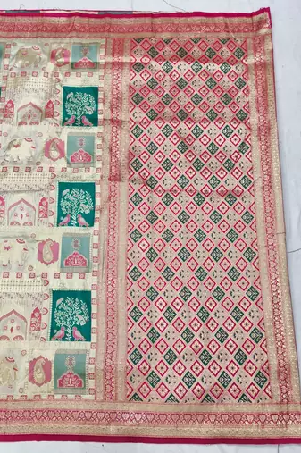 Cream zari woven patola silk blend festive saree with blouse piece