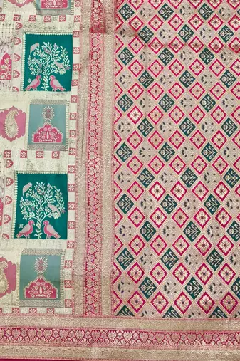 Cream zari woven patola silk blend festive saree with blouse piece