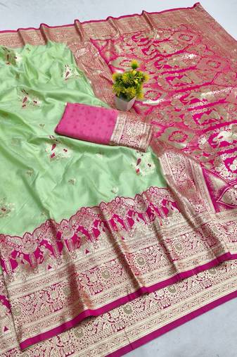 Light green zari woven banarasi silk blend saree with blouse piece