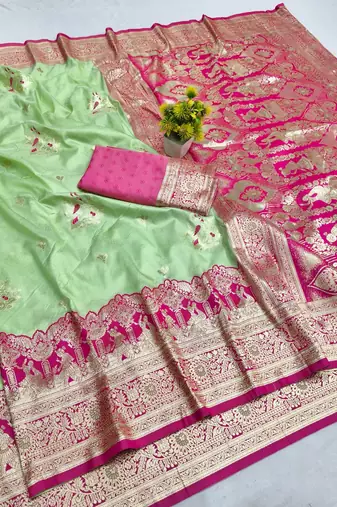 Light green zari woven silk blend saree with blouse piece