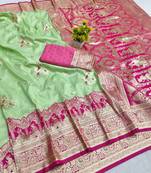 Light green zari woven banarasi silk blend saree with blouse piece