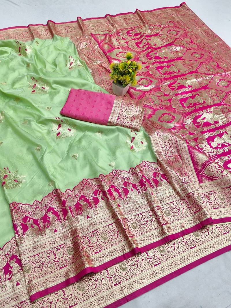 Light green zari woven banarasi silk blend saree with blouse piece