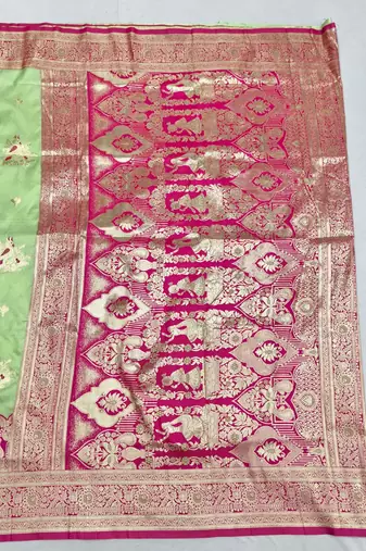 Light green zari woven silk blend saree with blouse piece