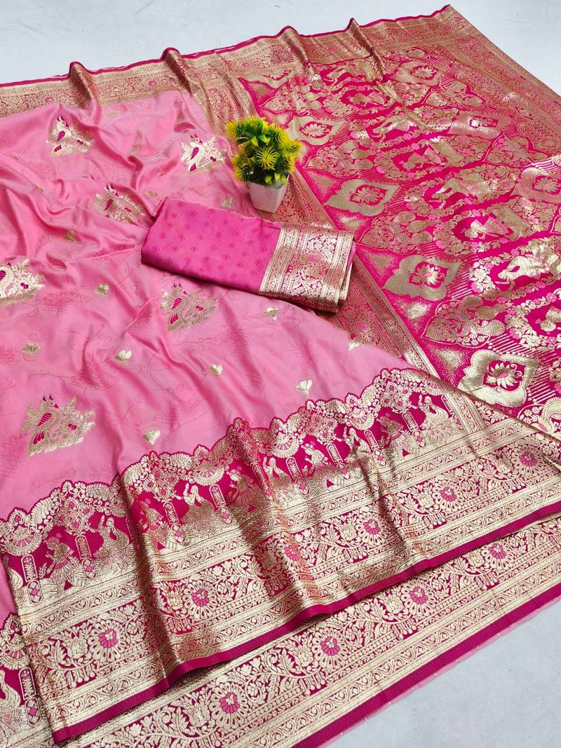 Pink zari woven banarasi silk blend saree with blouse piece