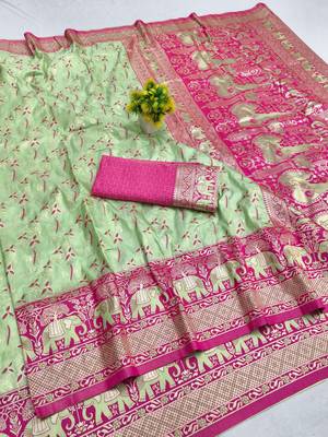 Light green zari woven silk blend saree with blouse piece 1