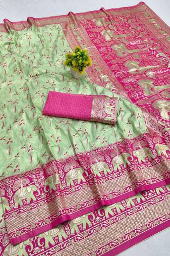 Light green zari woven banarasi silk blend saree with blouse piece