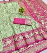 Light green zari woven banarasi silk blend saree with blouse piece