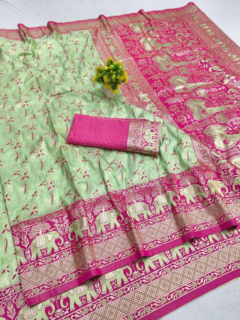Light green zari woven banarasi silk blend saree with blouse piece