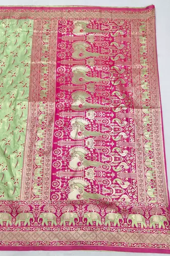 Light green zari woven silk blend saree with blouse piece