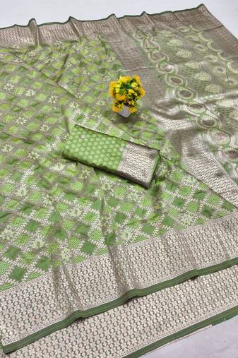 Light green zari woven silk blend saree with blouse piece