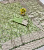 Light green zari woven banarasi silk blend saree with blouse piece