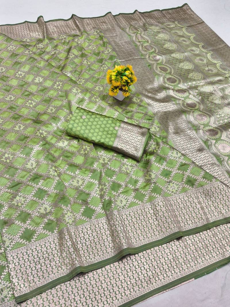 Light green zari woven banarasi silk blend saree with blouse piece