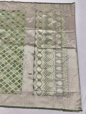 Light green zari woven silk blend saree with blouse piece 2