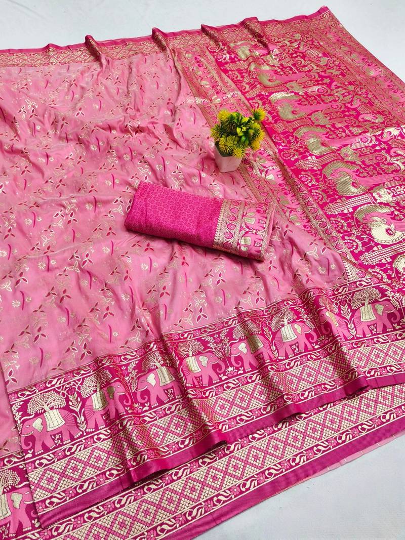 Pink zari woven banarasi silk blend saree with blouse piece